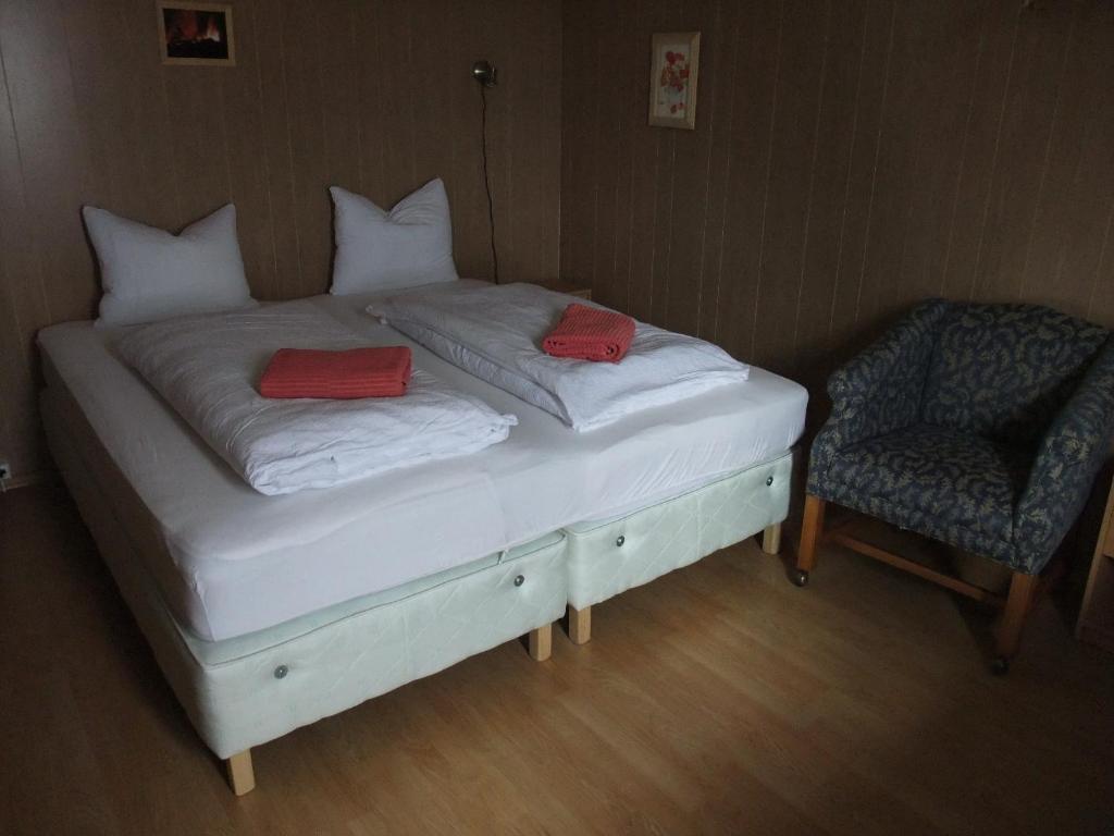 Postel nebo postele na pokoji v ubytování apartment Neðra-Vatnshorn