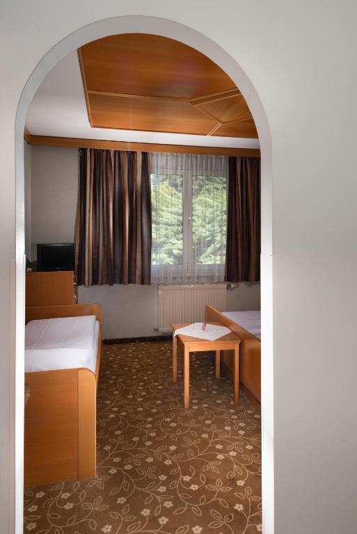Postel nebo postele na pokoji v ubytování Hotel Gasthof Seeland