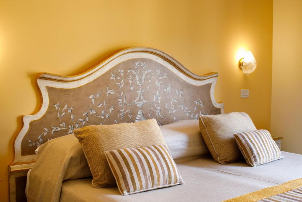 Postel nebo postele na pokoji v ubytování Hotel Zi' Teresa