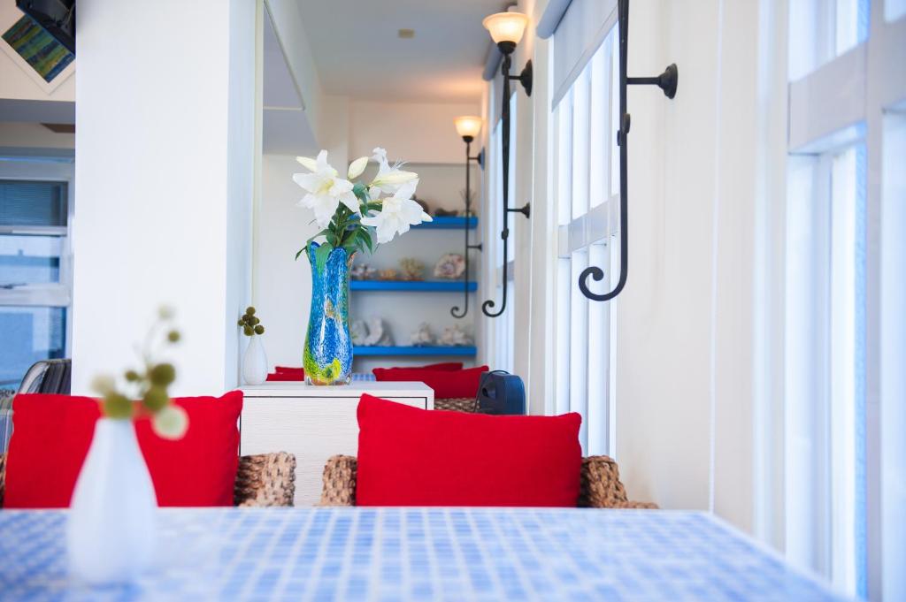 Postel nebo postele na pokoji v ubytování Indigo Homestay