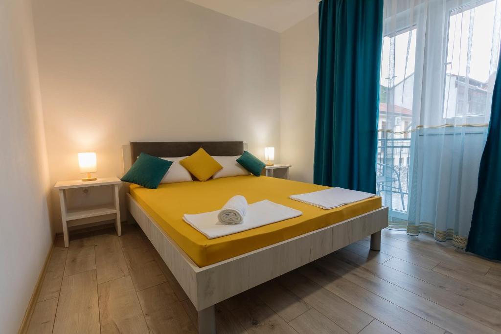 Postel nebo postele na pokoji v ubytování Villa Odobasic Rooms