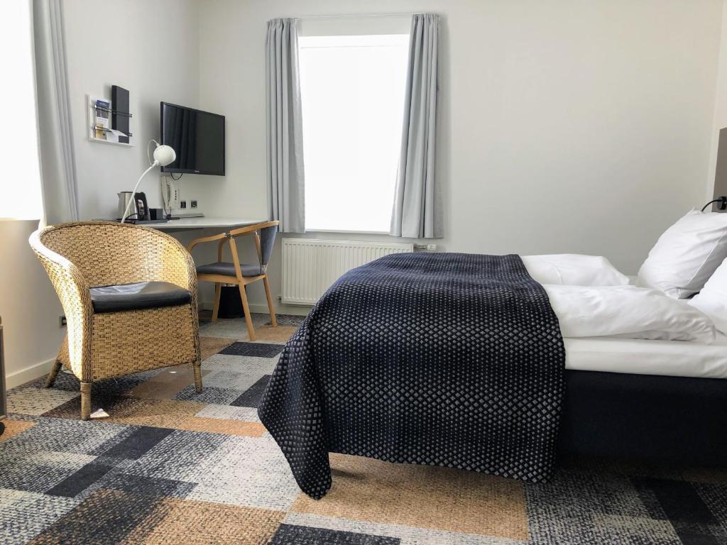 Voodi või voodid majutusasutuse Hotel Skivehus toas