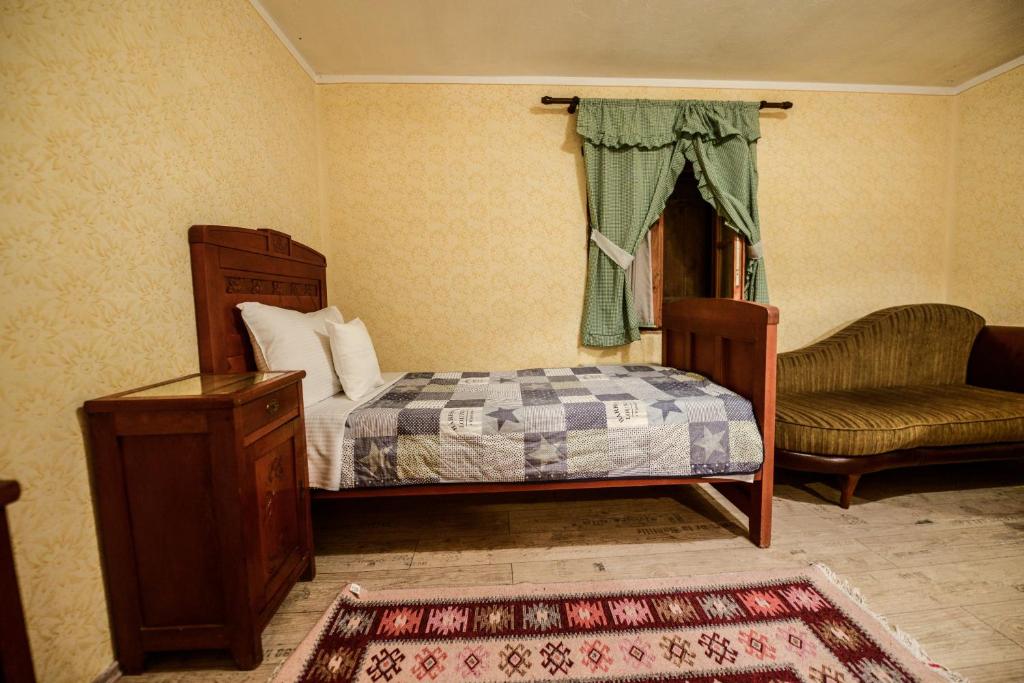Postel nebo postele na pokoji v ubytování Srpsko Andrejevo Selo