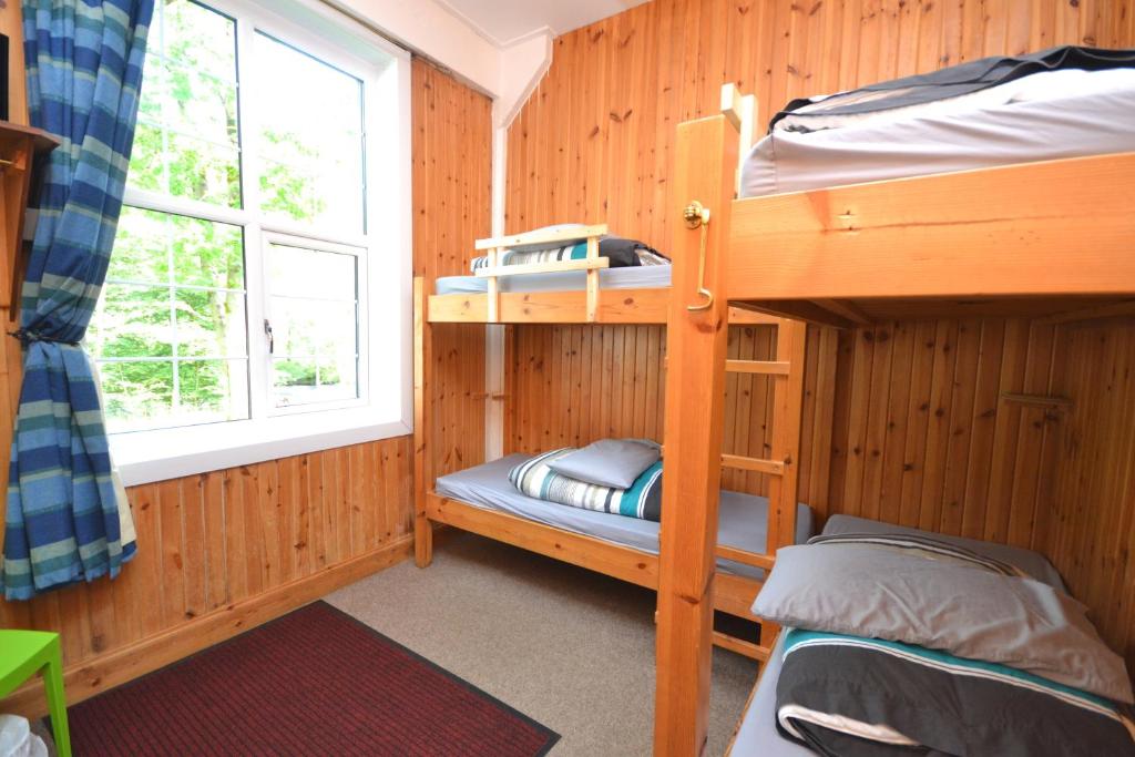 Postel nebo postele na pokoji v ubytování Blackwater Hostel