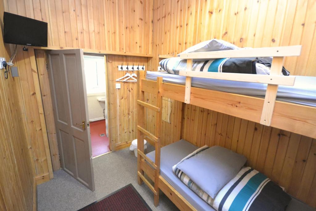 Postel nebo postele na pokoji v ubytování Blackwater Hostel