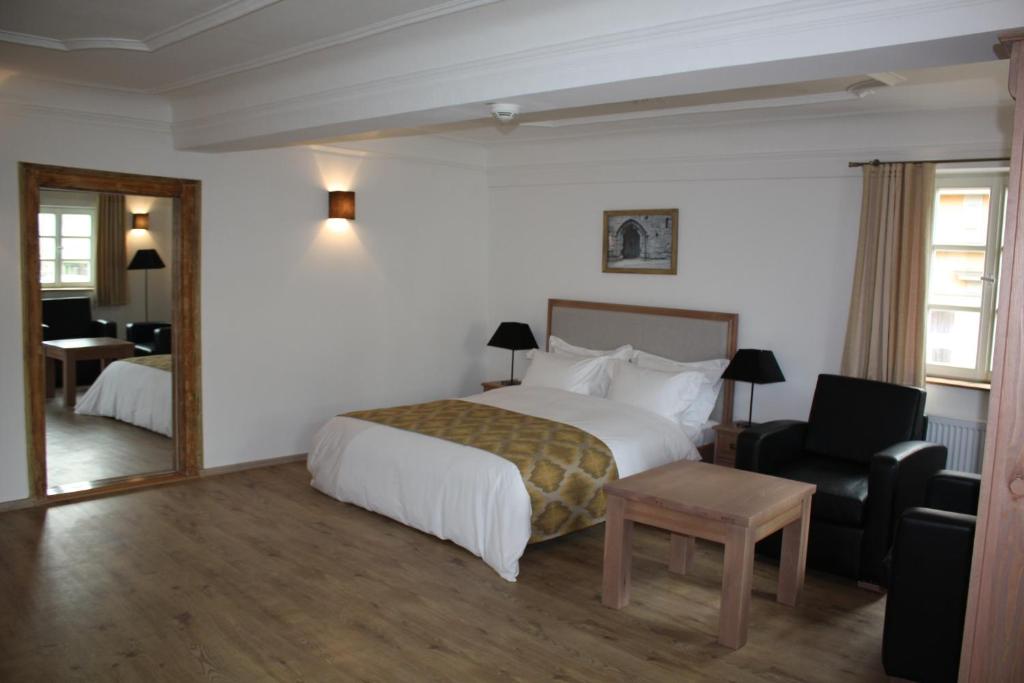 Postel nebo postele na pokoji v ubytování Hotel Hahnmühle 1323