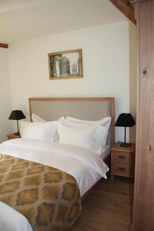 Postel nebo postele na pokoji v ubytování Hotel Hahnmühle 1323