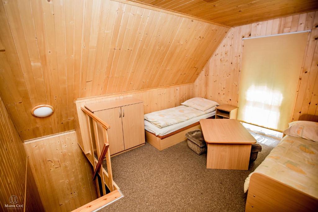 Letto o letti in una camera di Cichy Zakątek