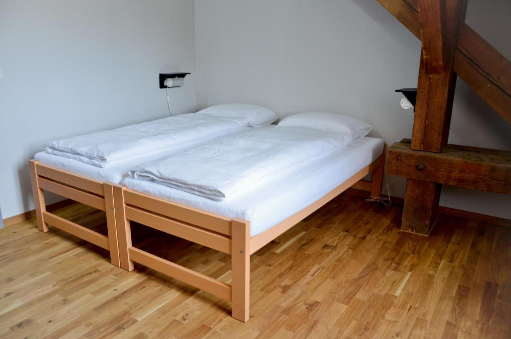 Postel nebo postele na pokoji v ubytování Depot 195 - Hostel Winterthur