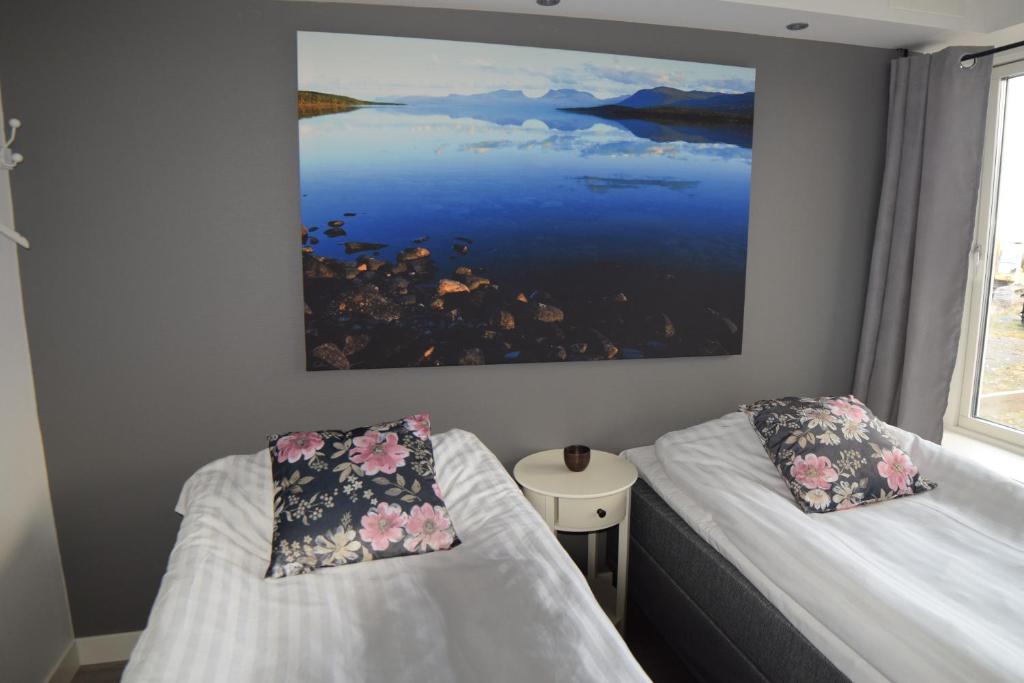 Postel nebo postele na pokoji v ubytování Abisko Hostel