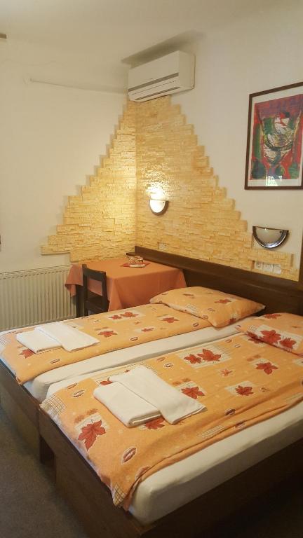 Postel nebo postele na pokoji v ubytování Pri Ancki B&B Ljubljana suburbs