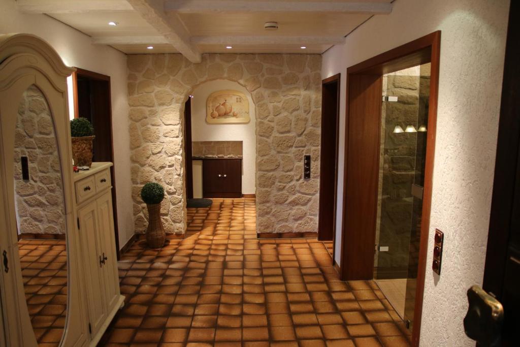 a hallway of a home with a tile floor at Appartement Sto in Hannover