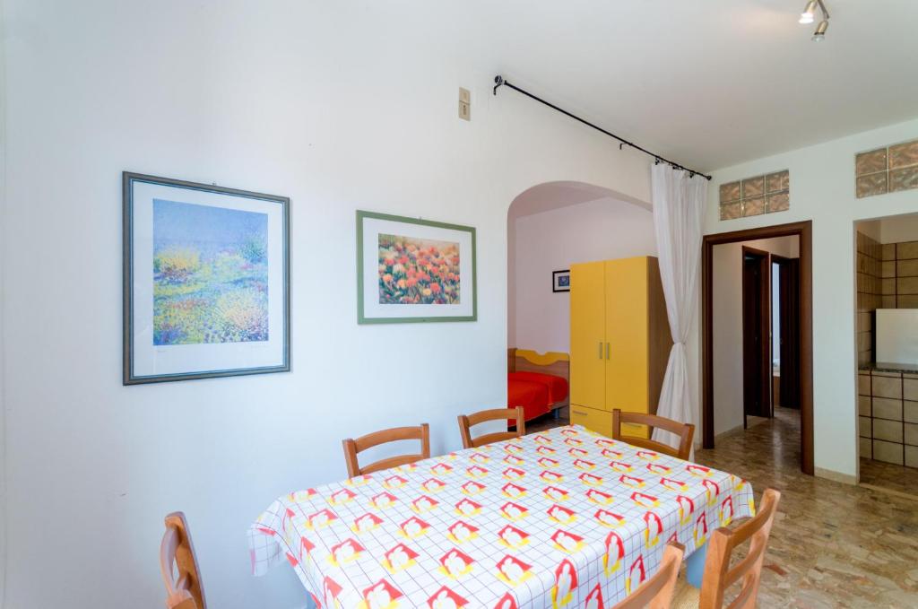 A bed or beds in a room at Corimbo