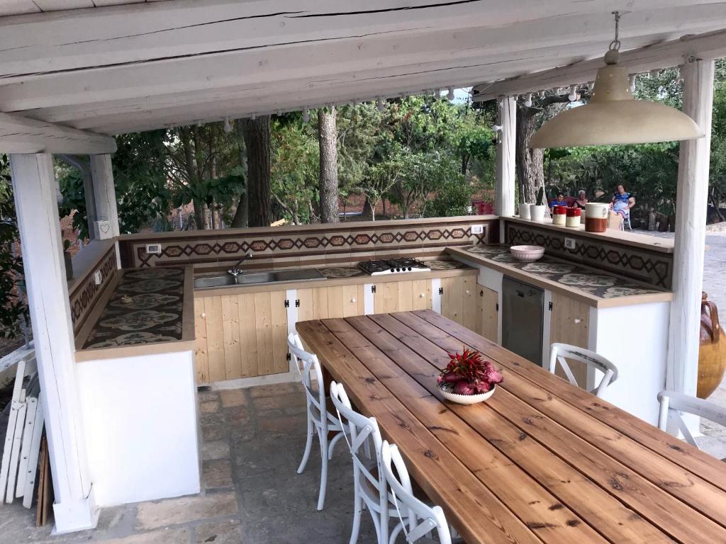 A balcony or terrace at Trulli Storie di Puglia - Private Pool