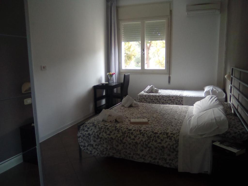 Postel nebo postele na pokoji v ubytování Fasthotel