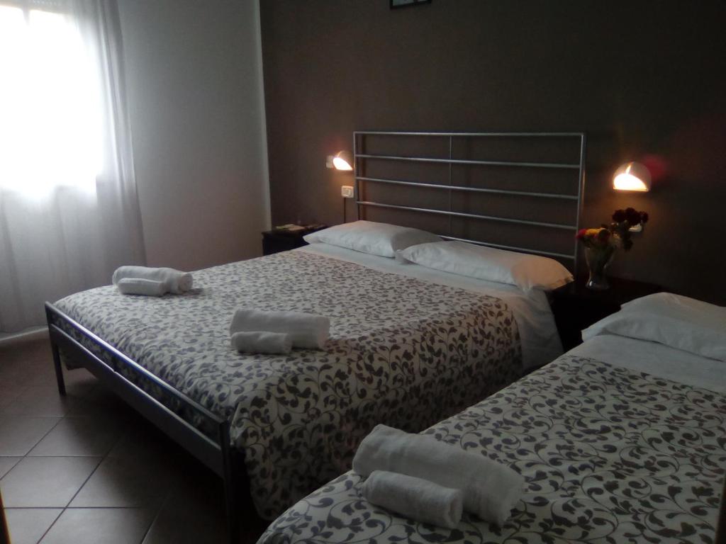 Postel nebo postele na pokoji v ubytování Fasthotel