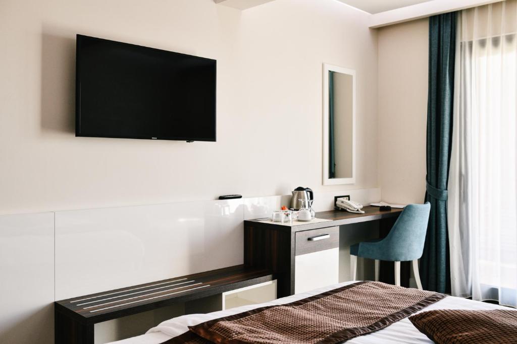 TV a/nebo společenská místnost v ubytování Wellness & Spa Hotel ACD