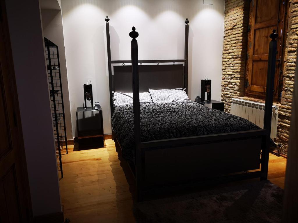 Postel nebo postele na pokoji v ubytování El Capricho de Sagasta