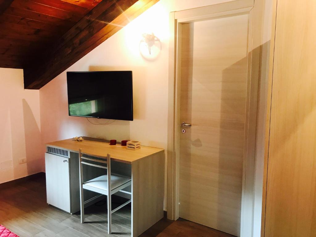 Una televisión o centro de entretenimiento en B&B Lanziani