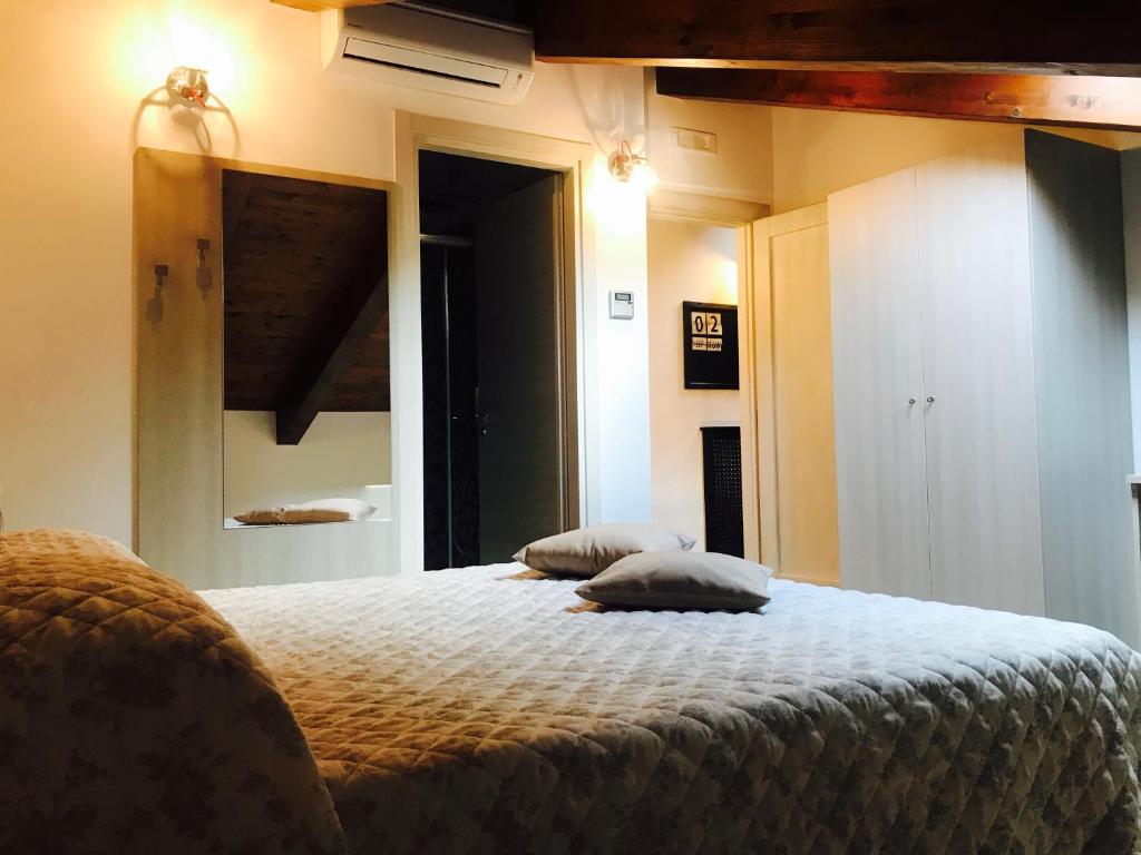Una cama o camas en una habitación de B&B Lanziani