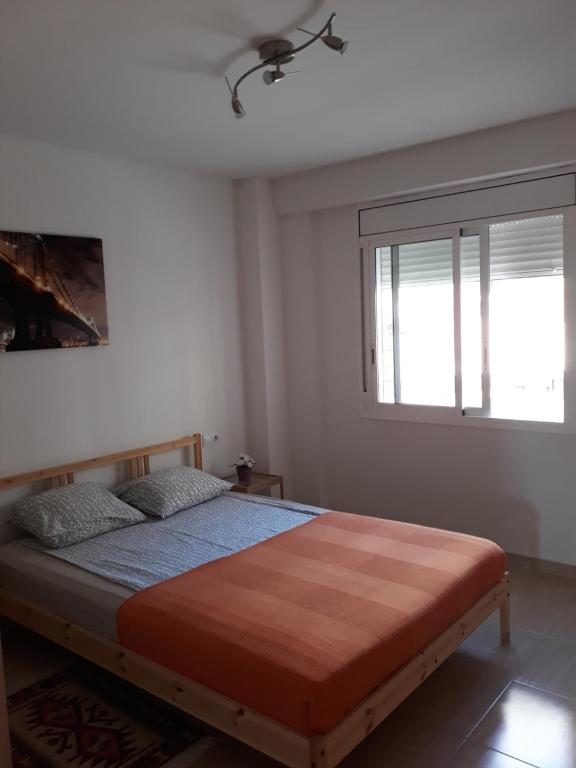Postel nebo postele na pokoji v ubytování Apartment Verge de Montserrat