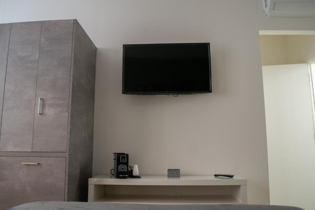 Televízia a/alebo spoločenská miestnosť v ubytovaní Warrest - Short Rent Apartments
