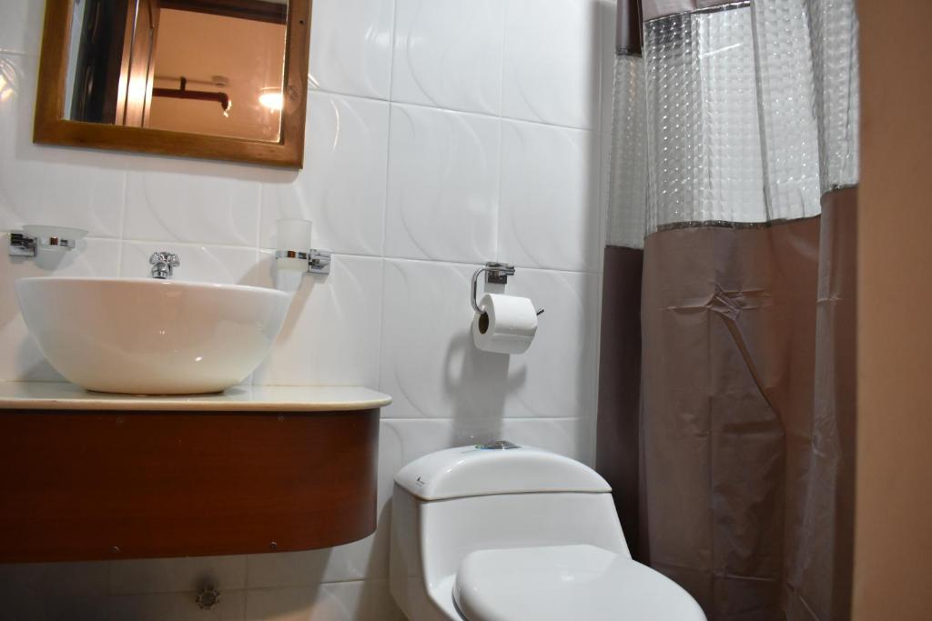 Koupelna v ubytování Hotel Bonanza
