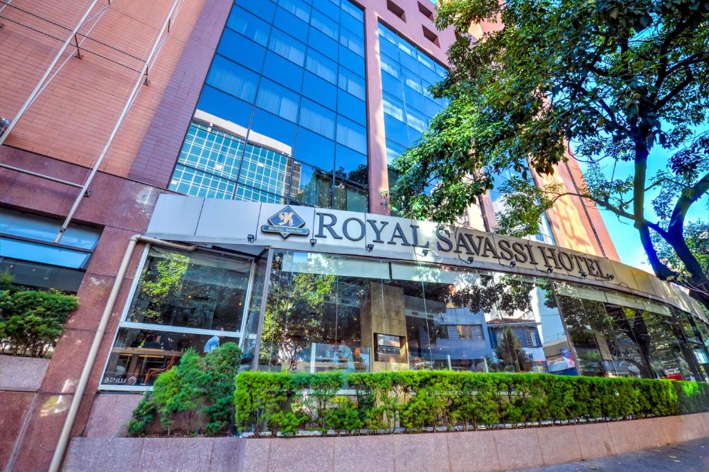 a building with a sign that reads royal swiss embassy hospital at Royal Boutique Savassi Hotel in Belo Horizonte