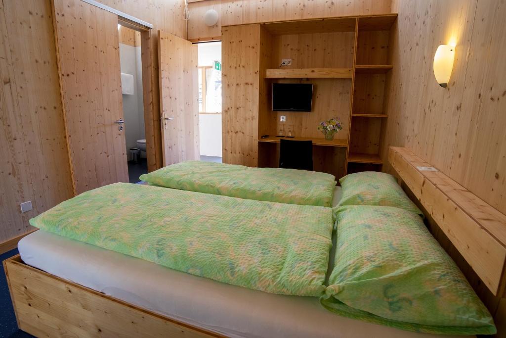 Postel nebo postele na pokoji v ubytování Familienhotel Campagna