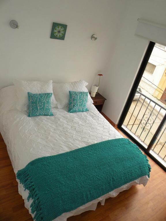 Postel nebo postele na pokoji v ubytování B&B Hostel CasaMoro