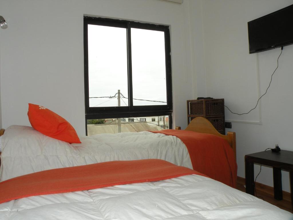 Postel nebo postele na pokoji v ubytování B&B Hostel CasaMoro