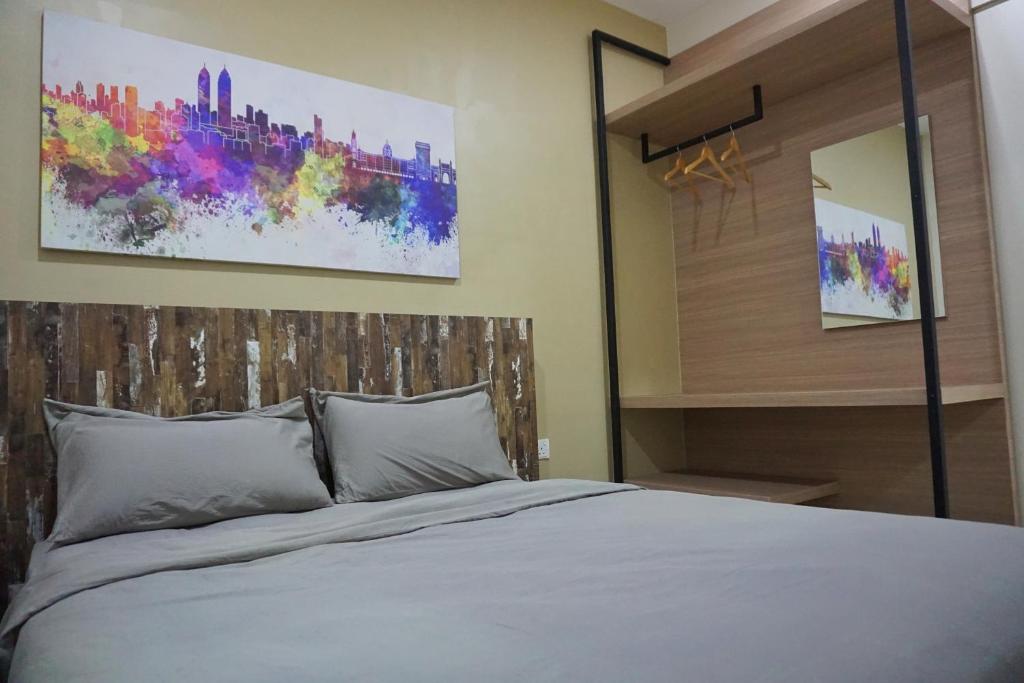 Postel nebo postele na pokoji v ubytování PM Octagon Ipoh Suites & Apartment 1