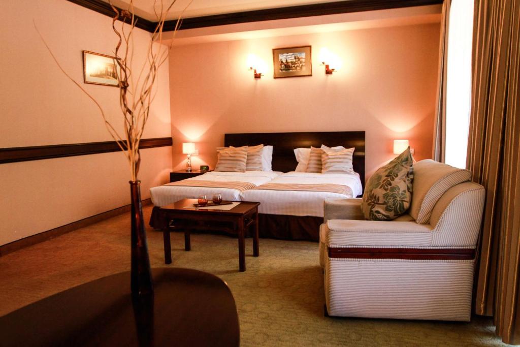 Postel nebo postele na pokoji v ubytování Best Western Plus Paradise Hotel Dilijan