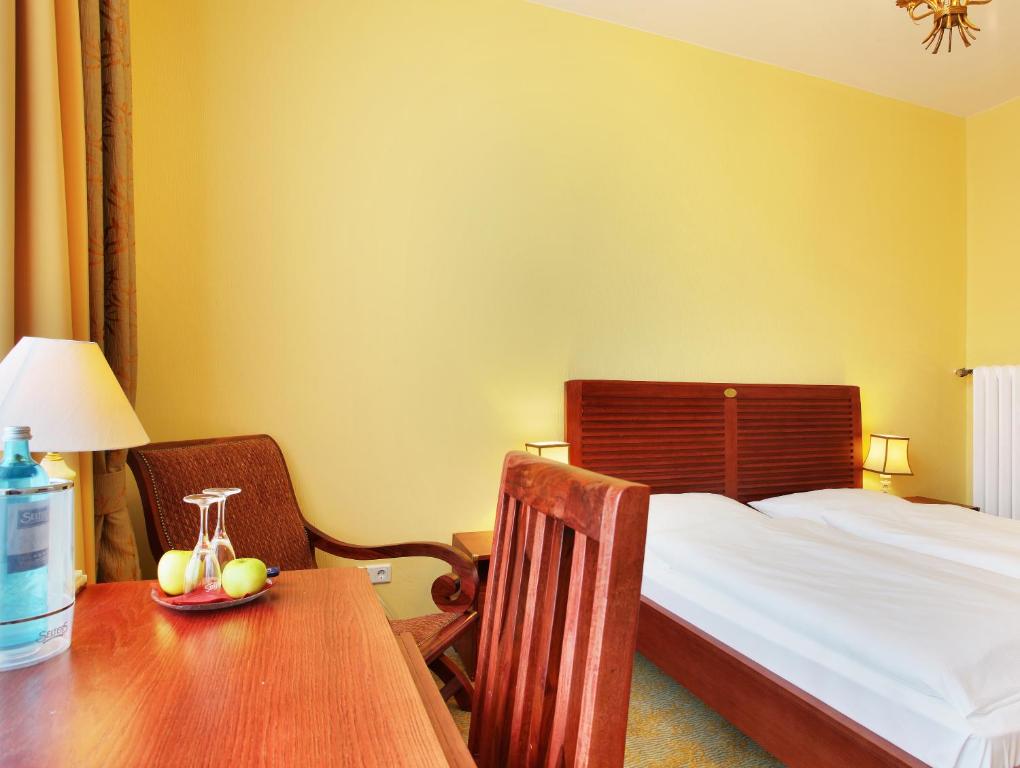 Postel nebo postele na pokoji v ubytování Hotel Bellmoor im Dammtorpalais