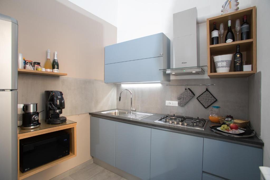 Kuchyň nebo kuchyňský kout v ubytování Le Quattro Stagioni - Rooms & Suites
