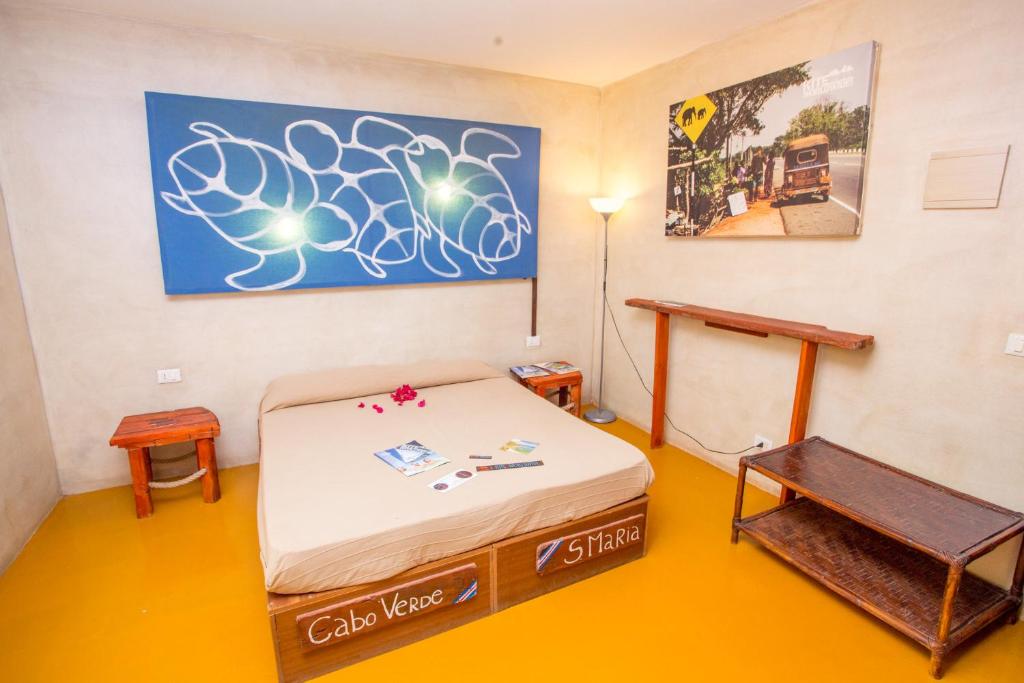 Postel nebo postele na pokoji v ubytování Surfactivity Guest House