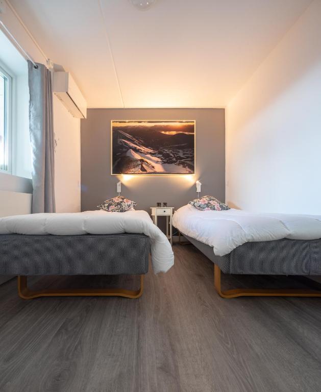Postel nebo postele na pokoji v ubytování Abisko Hostel