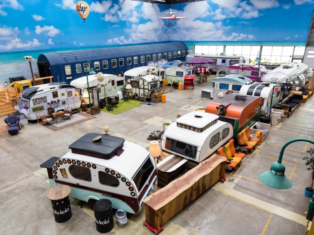 an aerial view of a bunch of rvs parked in a parking lot at BaseCamp Bonn in Bonn