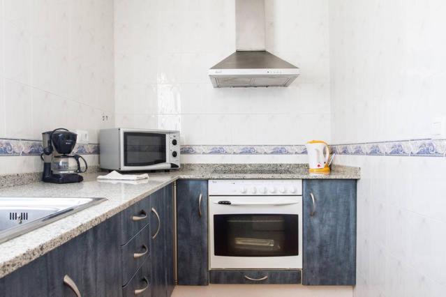 Kuchyň nebo kuchyňský kout v ubytování Apartamentos Nicaragua