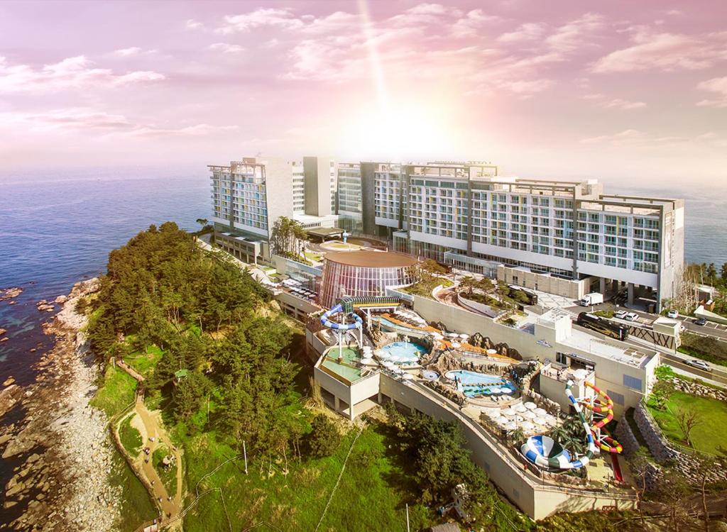 an aerial view of a resort with a water park at Lotte Resort Sokcho in Sokcho