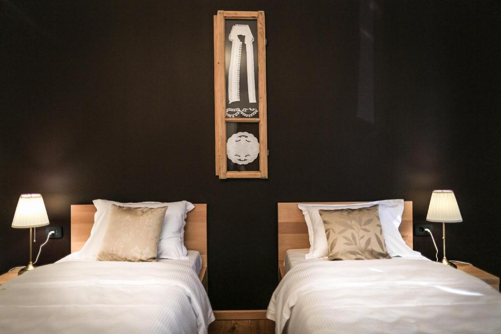 Postel nebo postele na pokoji v ubytování GARNI HOTEL ATRIUM