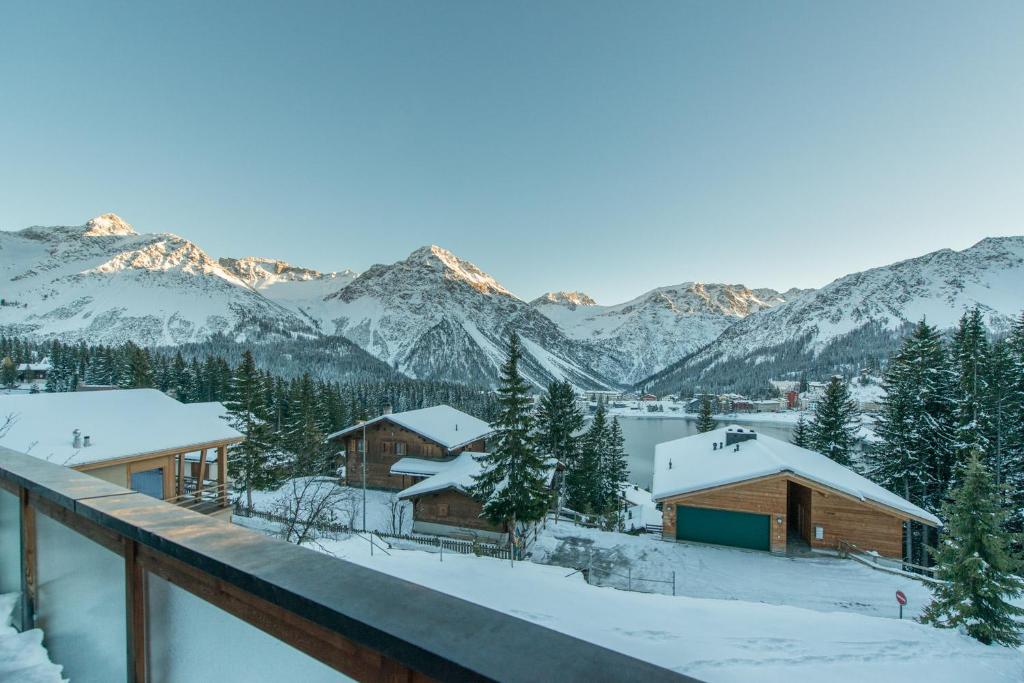 a view from the balcony of a cabin in the mountains at Casa Serena in Arosa