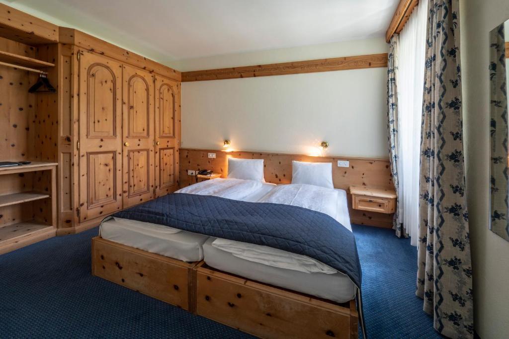 Postel nebo postele na pokoji v ubytování Hotel Maria