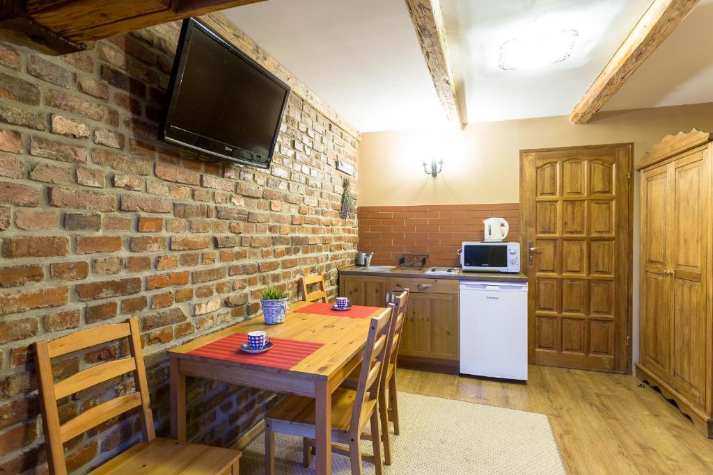 Kuchyňa alebo kuchynka v ubytovaní Apartamenty i Pokoje Aneta