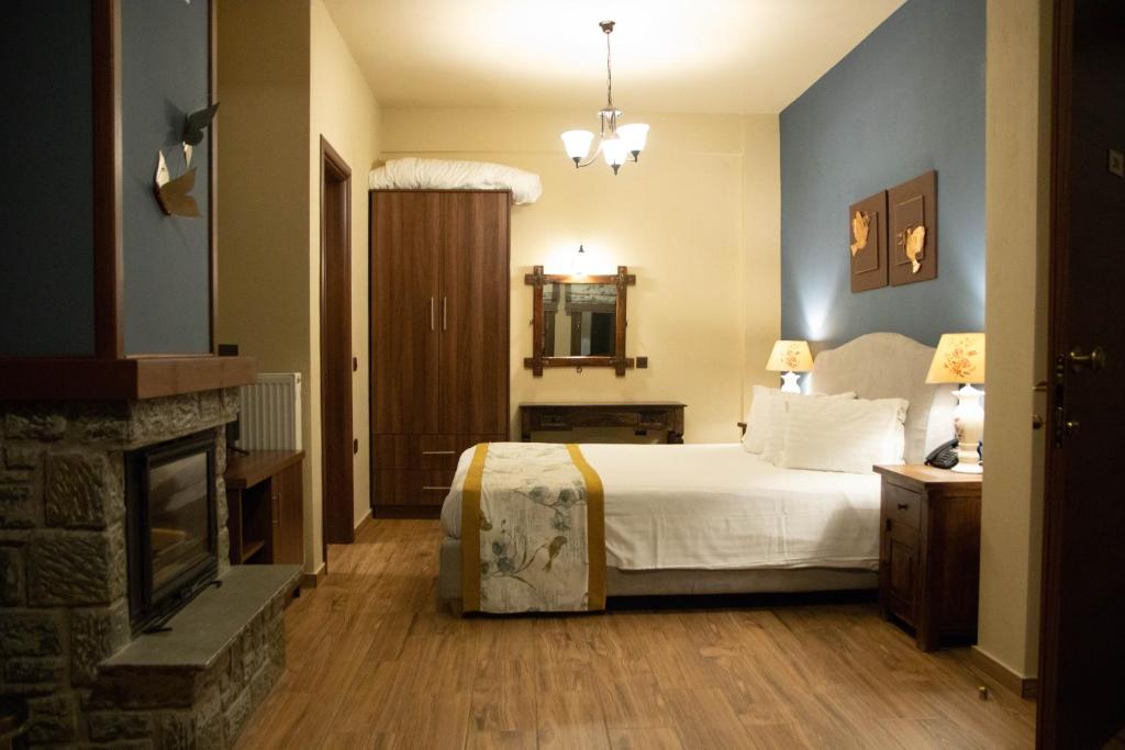 Postel nebo postele na pokoji v ubytování Pandion Luxury Boutique Hotel & Suites with Spa