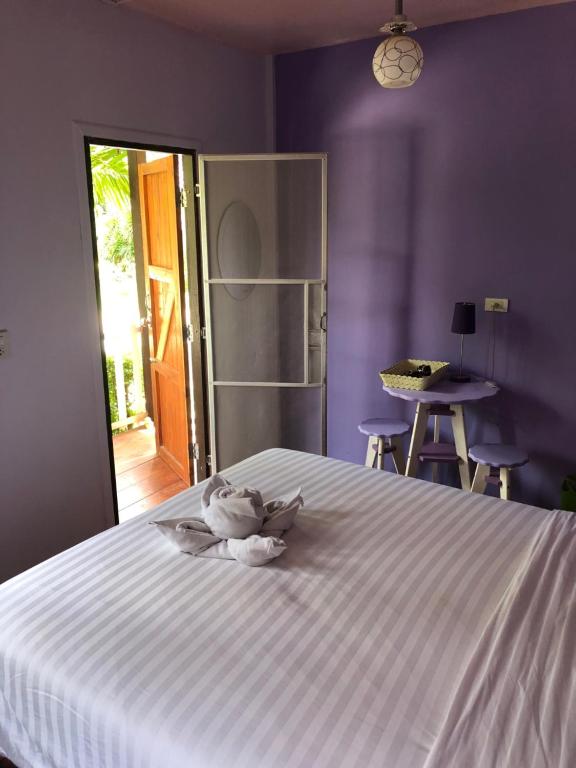 Postel nebo postele na pokoji v ubytování Sukhothai Indy Resort