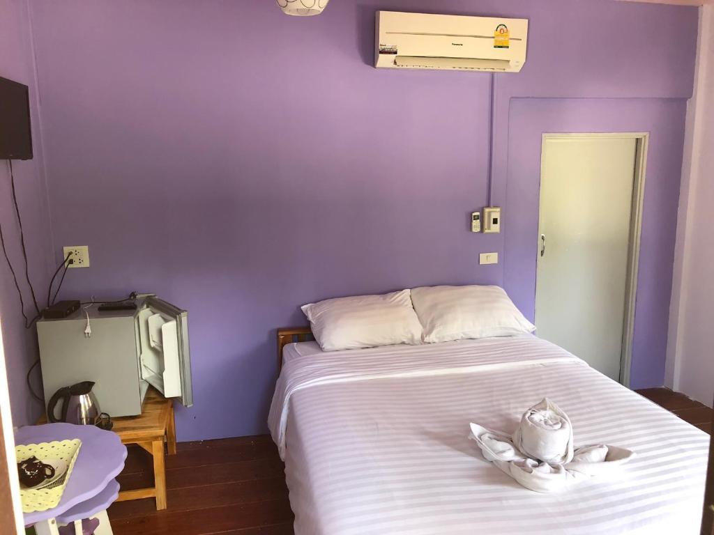 Postel nebo postele na pokoji v ubytování Sukhothai Indy Resort