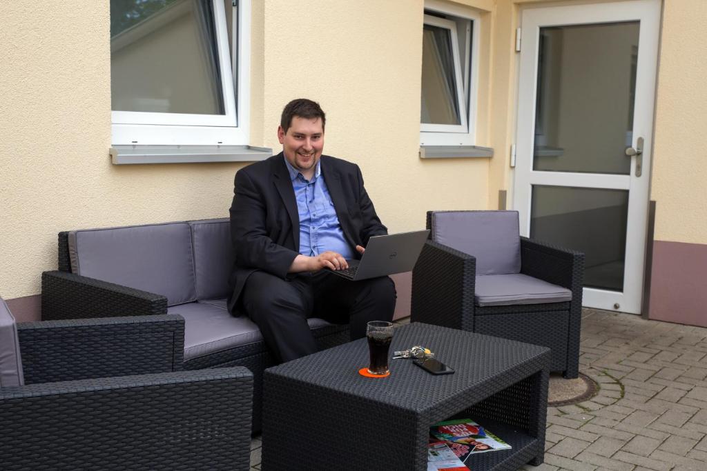 Posezení v ubytování Hotel & Apartment Am Theaterplatz