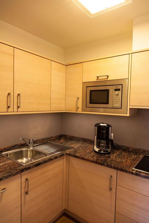 Kuchyň nebo kuchyňský kout v ubytování Residence Armonia