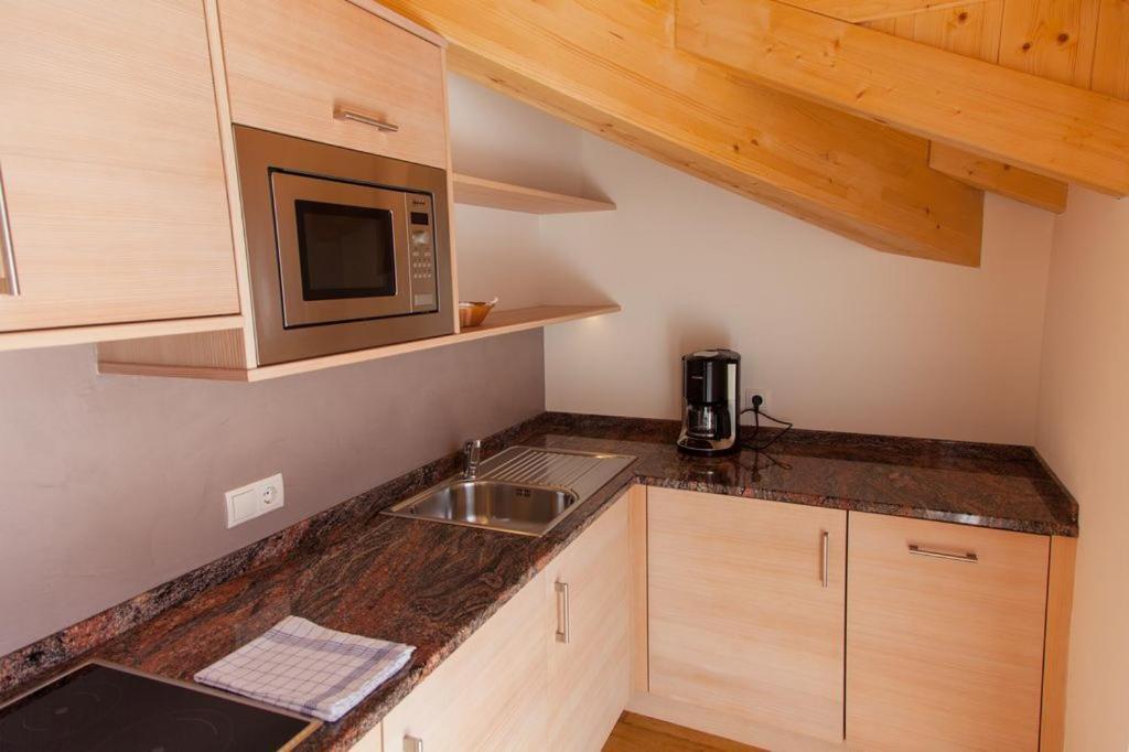 Kuchyň nebo kuchyňský kout v ubytování Residence Armonia